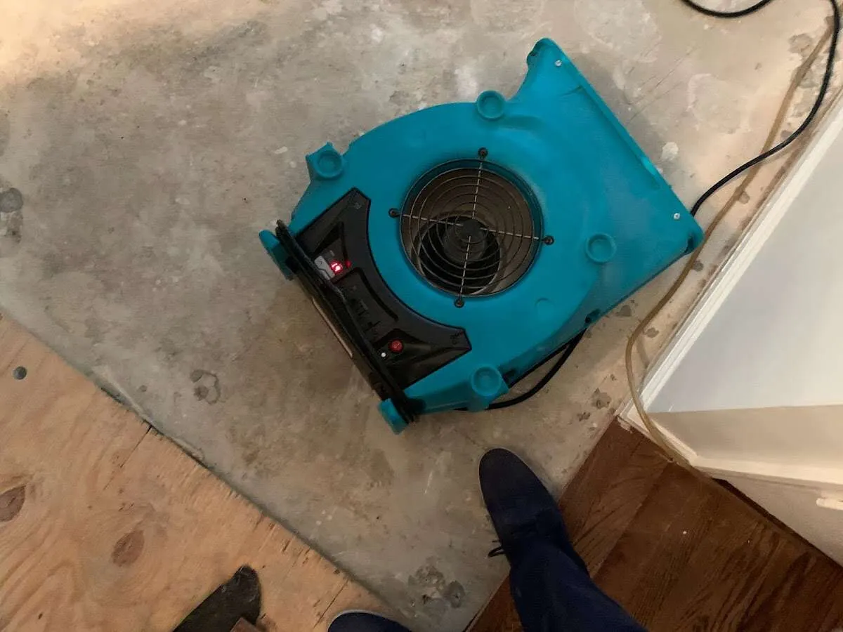 Air mover drying subfloor during Leak Detection & Repair in Granite Bay